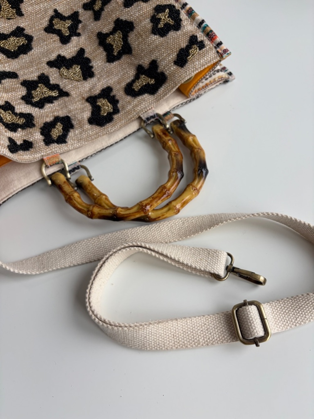 America & Beyond Luxe Leopard Tote Bag
Beaded Bamboo Handles Beige/Black/Orange - Picture 15 of 17